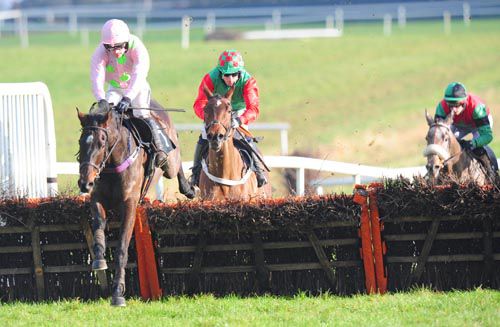 Max Dynamite (Ruby Walsh) draws clear of Phil's Magic at the last