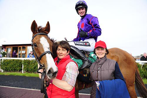 Tsundoku & Danny Mullins with trainer Mags Mullins (right) and groom Val Crean 