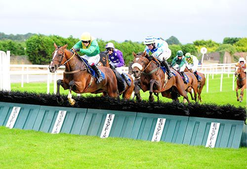 Lasoscar (David Mullins, green and yellow) and Craig Star (J J Slevin, white and blue) battle it out before dead-heating