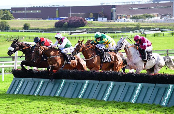 Aramon (second left) jumps to the front at the last in the Guinness Galway Hurdle