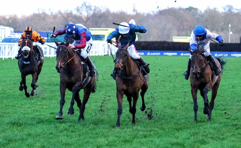 Paisley Park (2nd left) beating Thyme Hill in the Long Walk Hurdle at Ascot