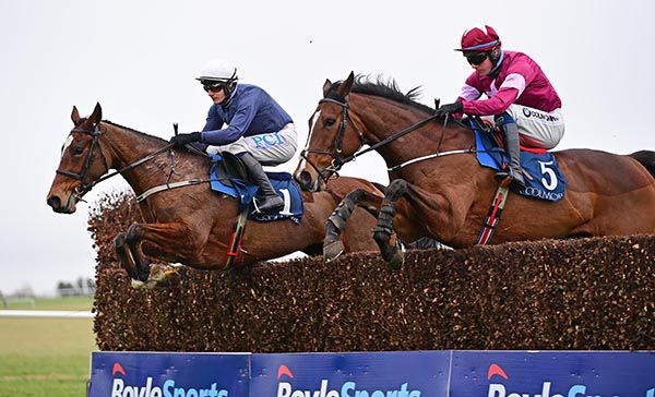 Colreevy (Paul Townend,far-side) jumps with Scarlet And Dove (Donagh Meyler)