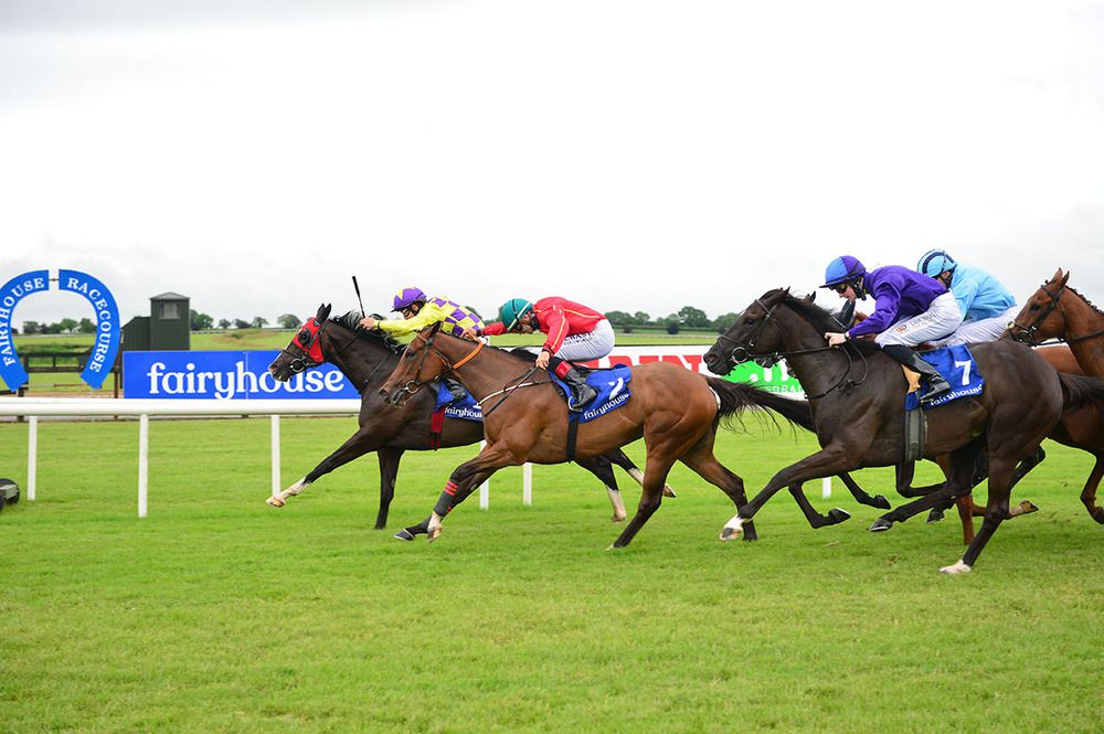 Inflection Point, far side, wins from Mrs Bouquet