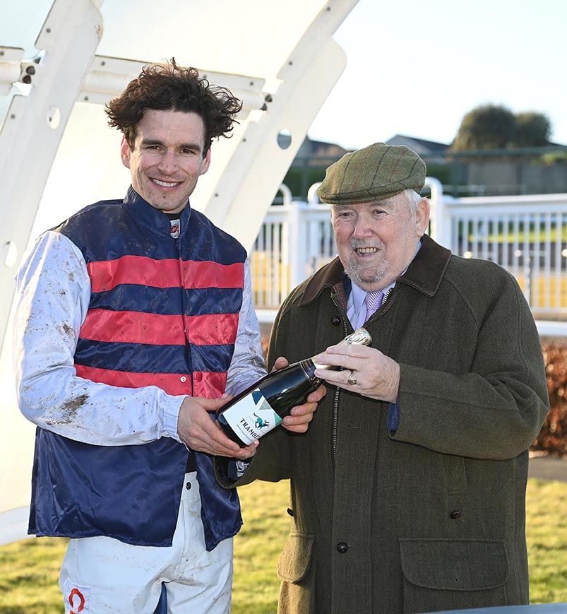 Karl Casey, of Tramore racecourse, makes a presentation to Danny Mullins following his 500th winner