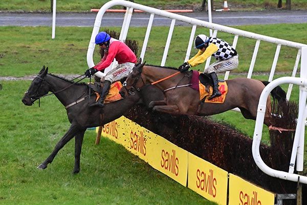 Winner Jungle Boogie chases tiring leader Classic Getaway at the last