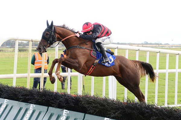 Mig Des Taillons and Luke Dempsey jump the last