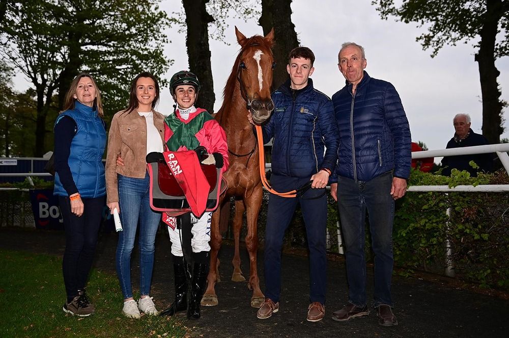 Simply Sideways and Ronan Whelan won for trainer Tim Doyle with wife Claire daughter Emma and son David 