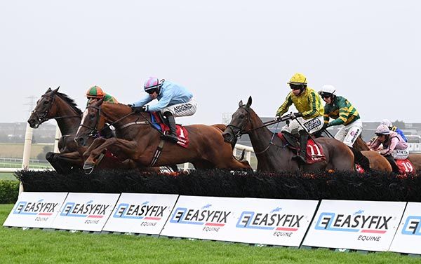 Alvaniy (centre) jumps to the front at the last under Brian Hayes